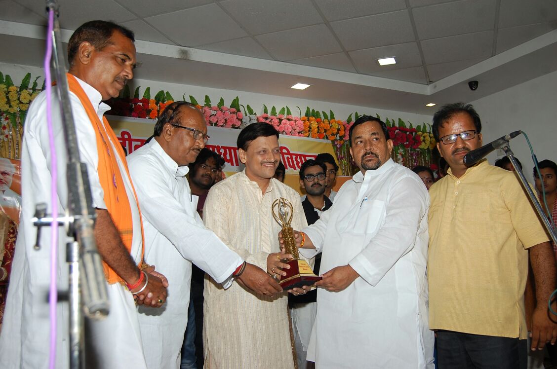 Receiving reward by Amit Dixit